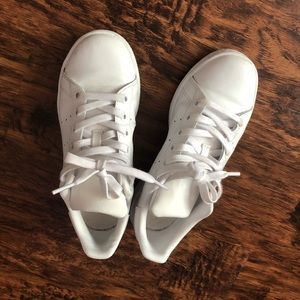All white Stan Smith sneakers